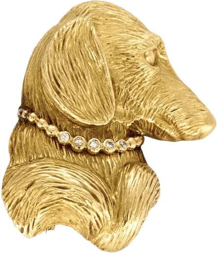 Broche tête de chien dorée